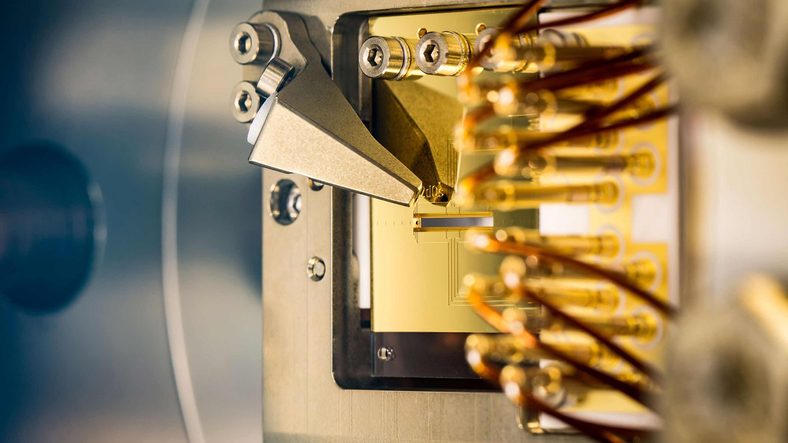 Monolithic ion trap for experiments with 2 dimensional ion crystals